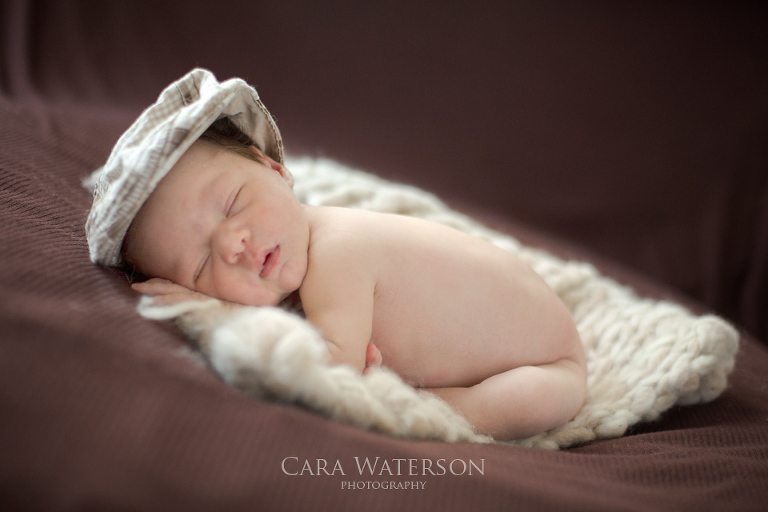 newborn in hat