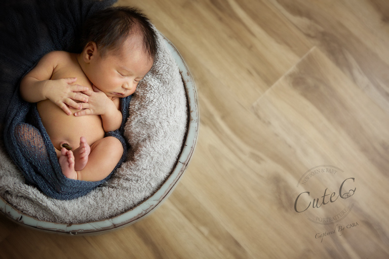 baby on wood floor