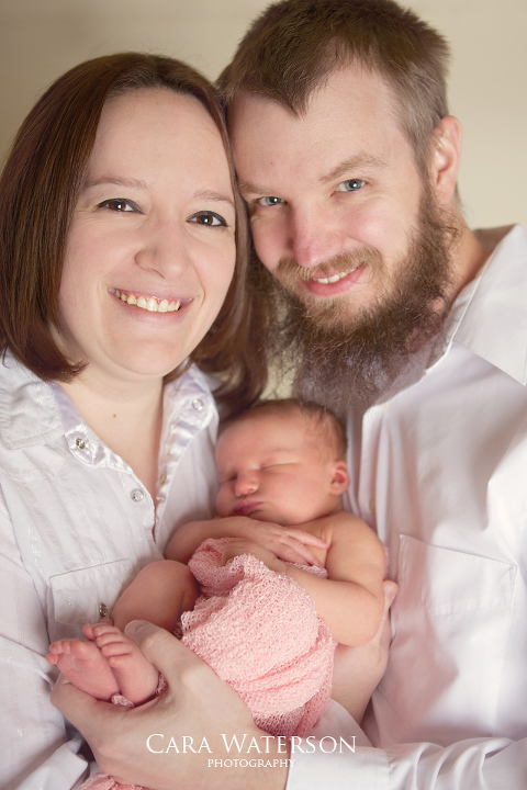 newborn with mom and dad