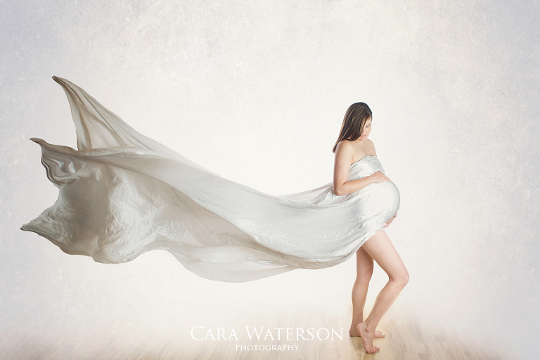 maternity in silver drape