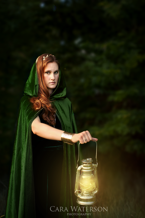 elven woman by lamp light