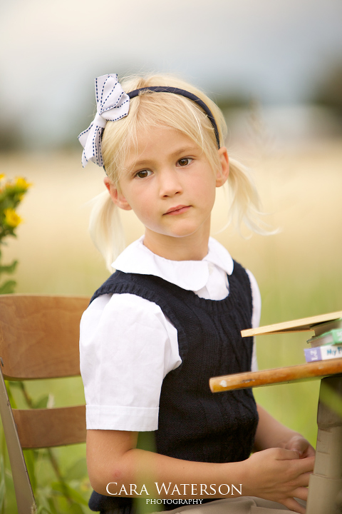 girl with blonde pigtails 