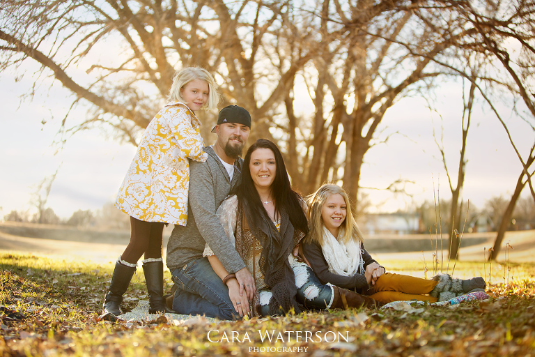 family at susnet in the park