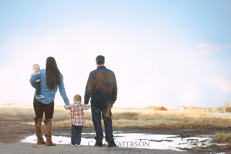 family gazing at the water