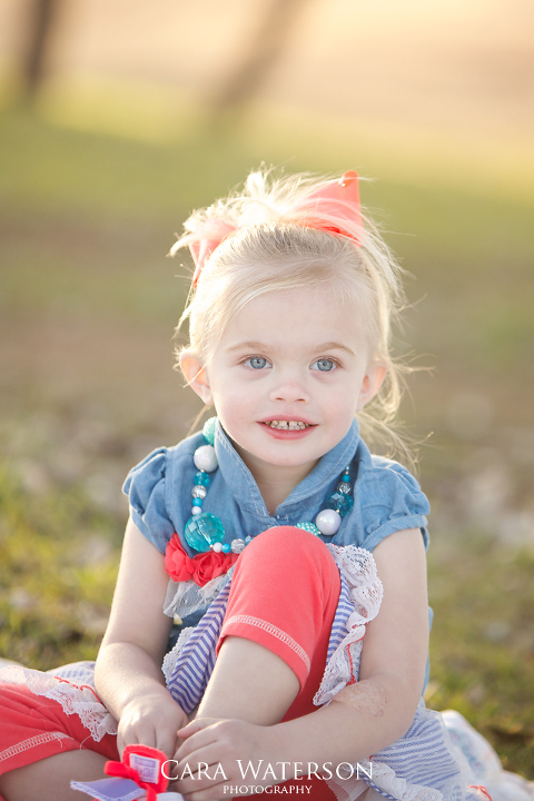 girl with coral bow