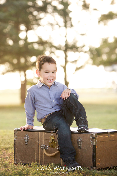 boy on a trunk