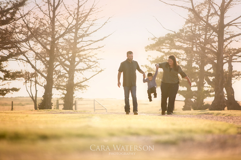 family walkind in the dusk