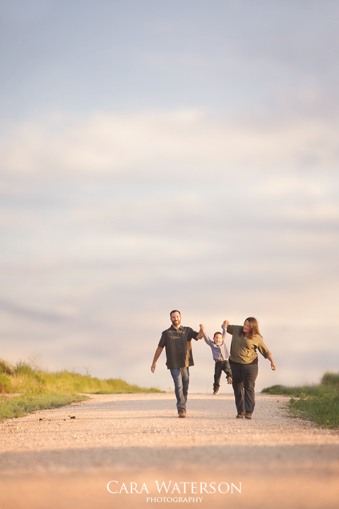 family walking down a road