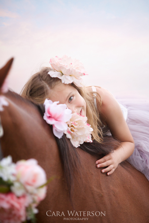 girl with horse and flowers