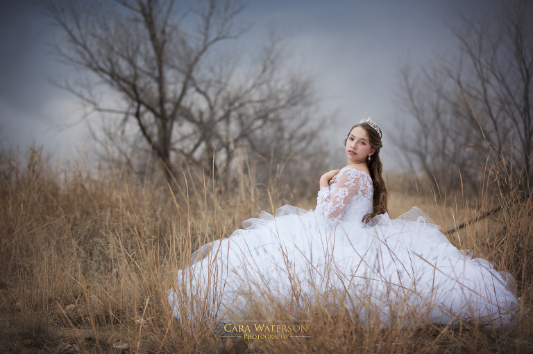 seated in the grass